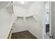 Spacious walk-in closet with ample shelving and natural light near the primary bathroom at 11910 E Amanda Rd, Gold Canyon, AZ 85118