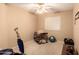 Bedroom with ceiling fan and basic furnishings at 1347 E Vernoa St, San Tan Valley, AZ 85140