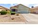 Beautiful single-story home with a well-maintained front yard and attached two-car garage at 1347 E Vernoa St, San Tan Valley, AZ 85140