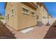 Exterior of home with fenced gravel yard at 1367 S Country Club Dr # 1295, Mesa, AZ 85210