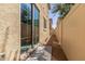Exterior of home with long gravel yard at 1367 S Country Club Dr # 1295, Mesa, AZ 85210