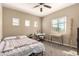 Cozy bedroom with multiple windows and a desk at 1367 S Country Club Dr # 1295, Mesa, AZ 85210