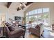 Clubhouse lounge area boasting high ceilings, exposed beams, and bright natural light at 1367 S Country Club Dr # 1295, Mesa, AZ 85210