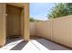 Welcoming home entrance with a charming door and a private courtyard area at 1367 S Country Club Dr # 1295, Mesa, AZ 85210
