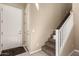 Inviting home foyer featuring a staircase and a crisp white front door at 1367 S Country Club Dr # 1295, Mesa, AZ 85210