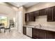 Charming kitchen with stainless steel dishwasher, granite countertops, and ample cabinet space at 1367 S Country Club Dr # 1295, Mesa, AZ 85210