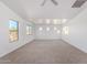 Huge bedroom with multiple windows that bring in plenty of light and a ceiling fan at 1430 E Douglas St, Casa Grande, AZ 85122