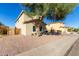 Charming home with desert landscaping, stucco siding, and a private backyard fence at 1430 E Douglas St, Casa Grande, AZ 85122
