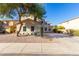 Beautiful two-story home with desert landscaping, stucco siding, and a welcoming front yard at 1430 E Douglas St, Casa Grande, AZ 85122