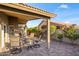Enjoyable backyard patio with comfortable seating, perfect for outdoor living at 15149 W Vale Dr, Goodyear, AZ 85395