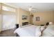 Comfortable bedroom featuring a ceiling fan, neutral decor, and ample natural light for a relaxing ambiance at 15149 W Vale Dr, Goodyear, AZ 85395