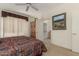 Bedroom with walk-in closet and ensuite bathroom at 15885 W Remington Dr, Surprise, AZ 85374