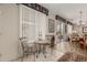 Inviting breakfast nook with tile floor and sunny window, perfect for casual dining at 15885 W Remington Dr, Surprise, AZ 85374