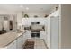 Well-equipped kitchen with granite countertops, stainless steel appliances, and ample storage space at 15885 W Remington Dr, Surprise, AZ 85374