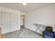 Cozy bedroom with carpeted floors, closet, and white walls provides a calming and inviting space at 16034 W Carmen Dr, Surprise, AZ 85374