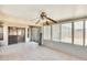 Enclosed sunroom with sliding doors and many windows providing an airy space at 16034 W Carmen Dr, Surprise, AZ 85374