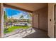 Private balcony with iron railing, offering outdoor views of the landscaped community at 17017 N 12Th St # 2012, Phoenix, AZ 85022