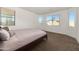 Bright bedroom with carpet, offering multiple windows and a cozy atmosphere at 18222 E La Posada Ct, Gold Canyon, AZ 85118
