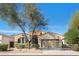 Charming single-story home featuring desert landscaping and a two-car garage at 18222 E La Posada Ct, Gold Canyon, AZ 85118