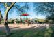 Outdoor community playground with shade canopies and mountain views at 18222 E La Posada Ct, Gold Canyon, AZ 85118