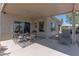 Inviting covered patio with ample space for outdoor dining and relaxing, providing shaded comfort at 19615 N Sunburst Way, Surprise, AZ 85374