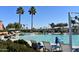 Resort-style pool area with lounge chairs and beautiful landscaping offers a relaxing outdoor retreat at 19615 N Sunburst Way, Surprise, AZ 85374