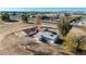 Aerial perspective of an older house needing repair, set on a large plot of land at 20521 E Germann Rd, Queen Creek, AZ 85142