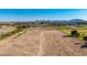 Expansive plot of land offering stunning views of the surrounding landscape and distant mountains at 20521 E Germann Rd, Queen Creek, AZ 85142