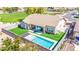 Aerial view of property, highlighting the beautiful backyard pool and outdoor living space at 20540 N 86Th Ln, Peoria, AZ 85382