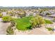 Aerial view of community green space with lush green grass and mature trees at 20540 N 86Th Ln, Peoria, AZ 85382