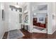Inviting entryway with tile flooring and a view into the home office at 20540 N 86Th Ln, Peoria, AZ 85382