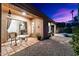 View of backyard patio, pool and desert landscaping, creating a perfect outdoor oasis at 20933 N 70Th Dr, Glendale, AZ 85308