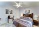 Cozy bedroom with a queen bed, soft lighting, and a tranquil ambiance perfect for restful nights at 2101 S Meridian Rd # 99, Apache Junction, AZ 85120
