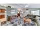 Open-concept living room blends seamlessly with the dining area, featuring cozy seating, neutral tones, and stylish accents at 2101 S Meridian Rd # 99, Apache Junction, AZ 85120