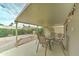 Covered patio with outdoor dining set, offering a relaxing outdoor space at 2101 S Meridian Rd # 99, Apache Junction, AZ 85120