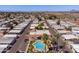 The community features a swimming pool, walking distance to all homes, in a park-like setting at 2121 N Center St # 141, Mesa, AZ 85201