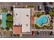 Aerial view of community pool with shuffleboard, recreation, ample parking, and common areas at 2121 N Center St # 141, Mesa, AZ 85201