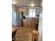 Efficient kitchen layout features light cabinets and stainless steel appliances at 2121 N Center St # 141, Mesa, AZ 85201