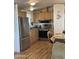 Well-equipped kitchen features light cabinets and stainless steel appliances at 2121 N Center St # 141, Mesa, AZ 85201