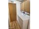 Functional laundry room with a side-by-side washer and dryer and overhead cabinets at 2121 N Center St # 141, Mesa, AZ 85201