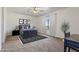 Cozy bedroom with carpet flooring, dark furniture, and scenic window view at 2285 E Chandler Heights Rd, Chandler, AZ 85249