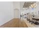 Dining room with open layout, hardwood floors, decorative lighting, and comfortable seating at 2285 E Chandler Heights Rd, Chandler, AZ 85249