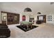 Large game room with pool table, lounge area, bar and unique wall decorations at 2285 E Chandler Heights Rd, Chandler, AZ 85249