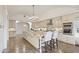 Bright kitchen features large island with granite countertops, modern appliances, and lots of cabinet space at 2285 E Chandler Heights Rd, Chandler, AZ 85249