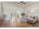 Bright and inviting living room with hardwood floors, neutral decor, and large windows at 2285 E Chandler Heights Rd, Chandler, AZ 85249