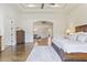 Spacious main bedroom featuring hardwood floors and natural light at 2285 E Chandler Heights Rd, Chandler, AZ 85249