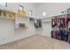 Large walk-in closet with custom shelving and ample storage at 2285 E Chandler Heights Rd, Chandler, AZ 85249