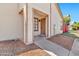 Inviting home exterior features a private entrance and well-maintained landscaping at 2455 E Broadway Rd # 13, Mesa, AZ 85204