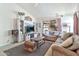 Spacious living room filled with natural light, featuring a cozy seating area and stylish decor at 2455 E Broadway Rd # 13, Mesa, AZ 85204