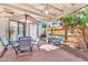 A cozy patio with a table and chairs, great for outdoor dining and relaxation at 2455 E Broadway Rd # 13, Mesa, AZ 85204